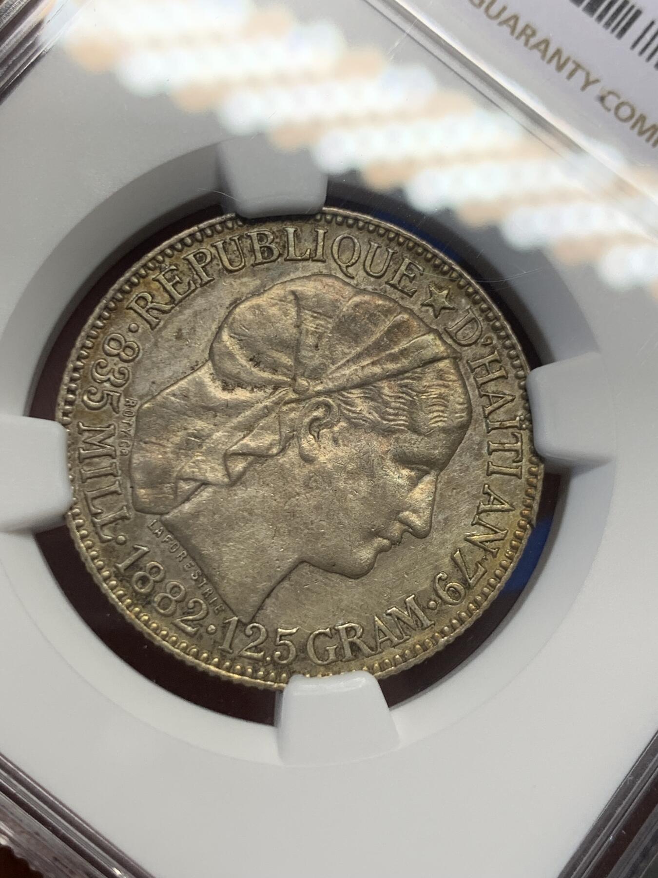 《竞宝斋》第394场 周日，周一，2场连拍 （全场包邮） NGC UNCD 海地1882年50分银币 带彩好品 有兴趣的可以砸盒试试