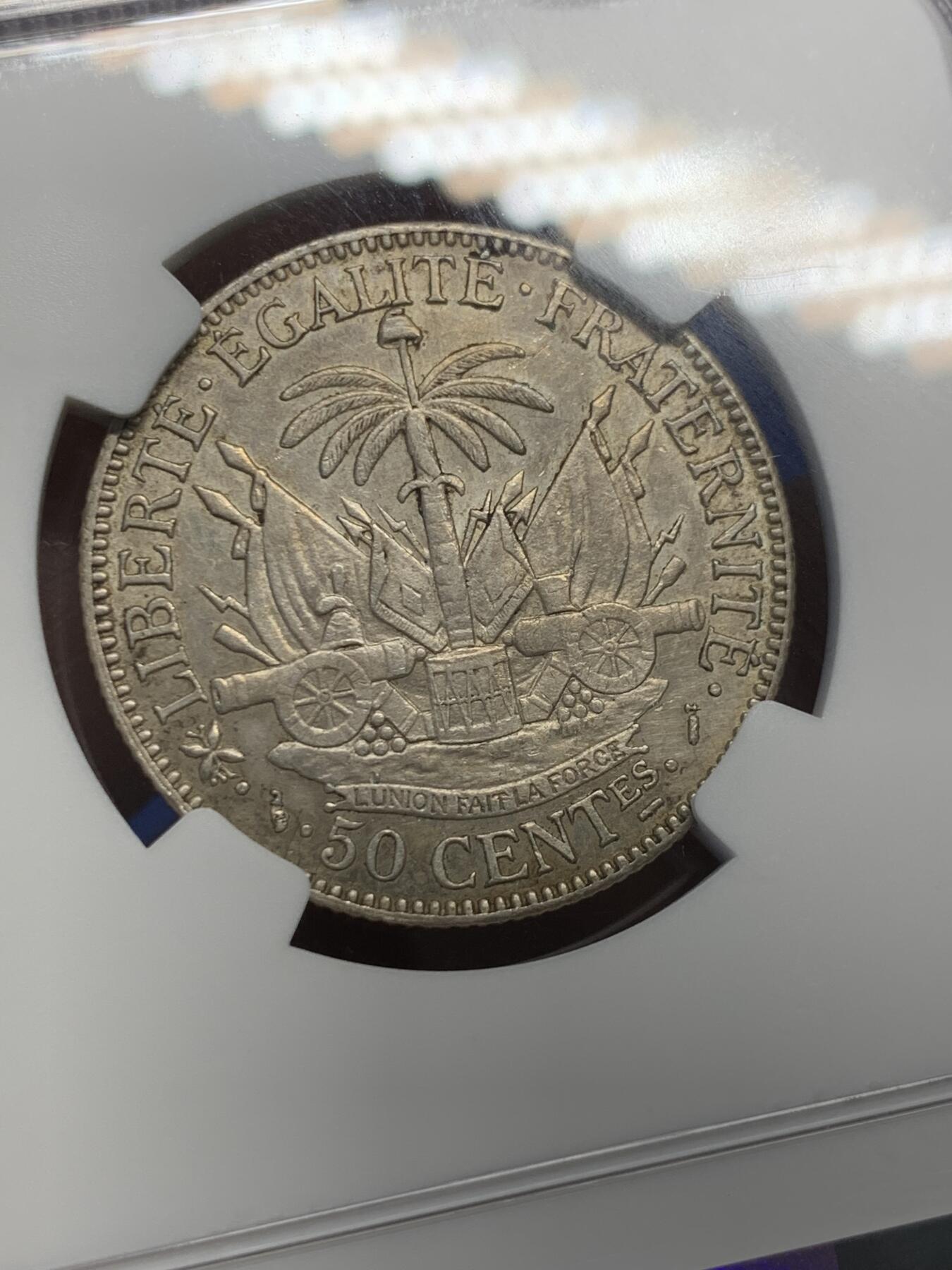 《竞宝斋》第394场 周日，周一，2场连拍 （全场包邮） NGC UNCD 海地1882年50分银币 带彩好品 有兴趣的可以砸盒试试