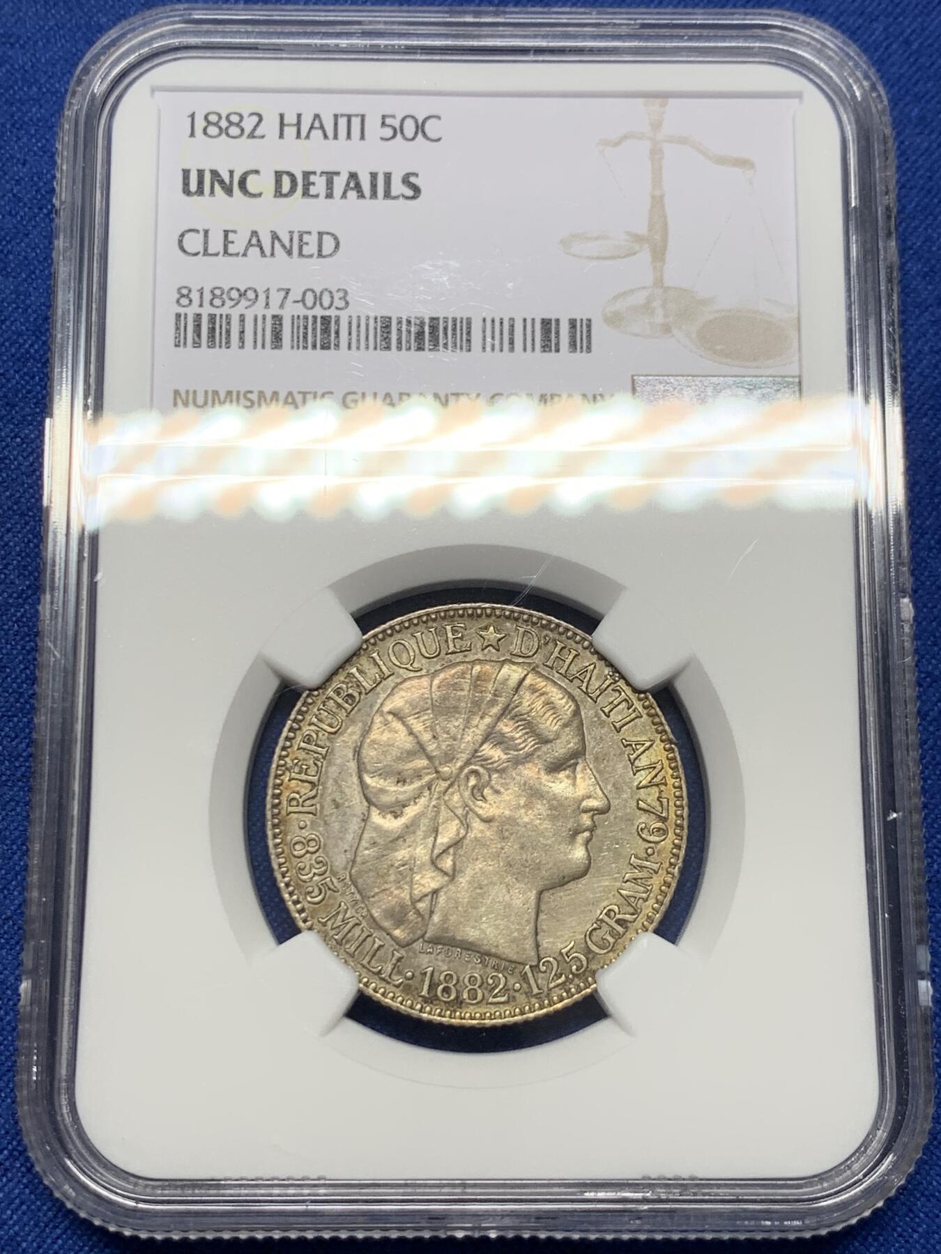 《竞宝斋》第394场 周日，周一，2场连拍 （全场包邮） NGC UNCD 海地1882年50分银币 带彩好品 有兴趣的可以砸盒试试