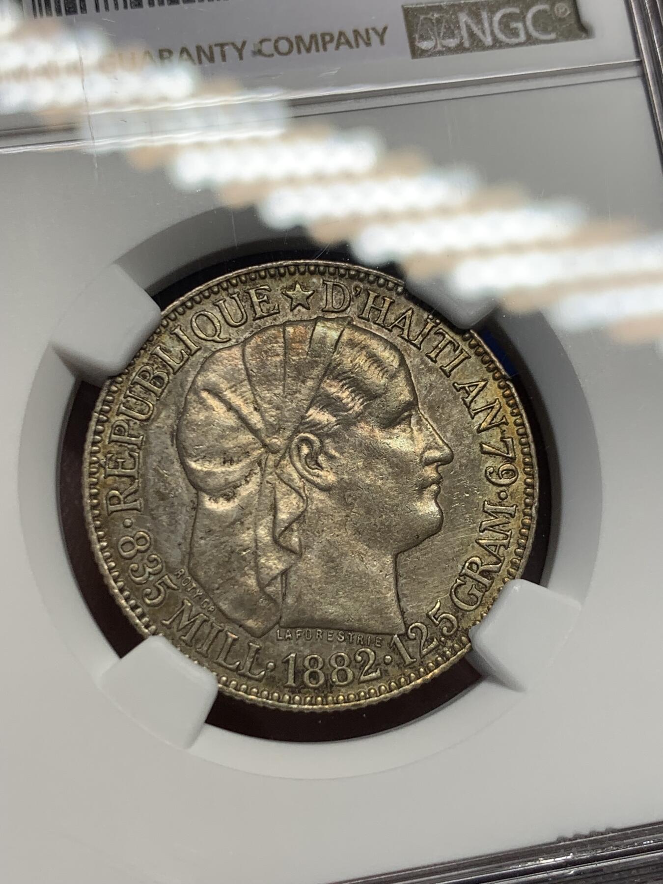 《竞宝斋》第394场 周日，周一，2场连拍 （全场包邮） NGC UNCD 海地1882年50分银币 带彩好品 有兴趣的可以砸盒试试