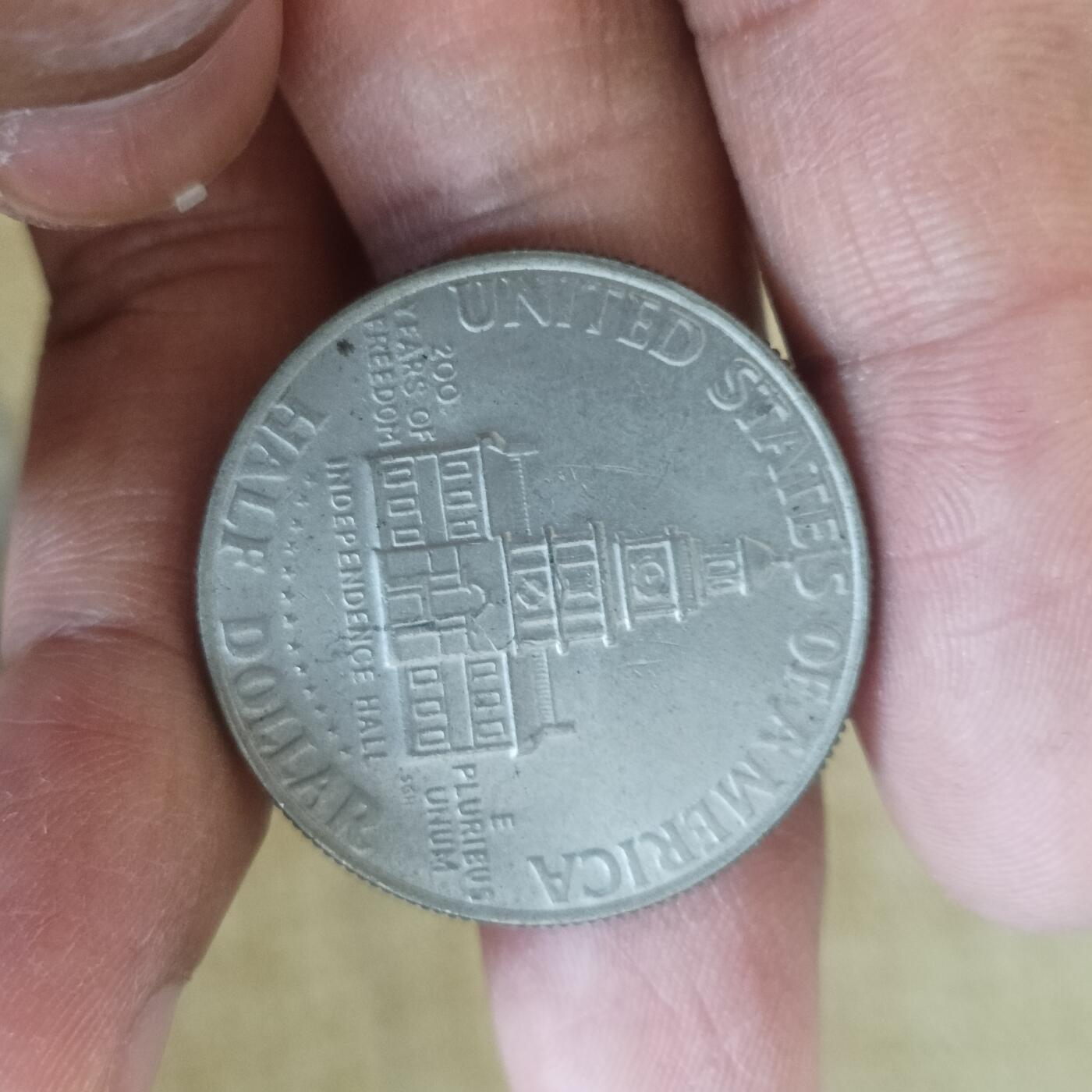 泡泡币外币第五十四场可代拍15038385335微信 美国76年半元