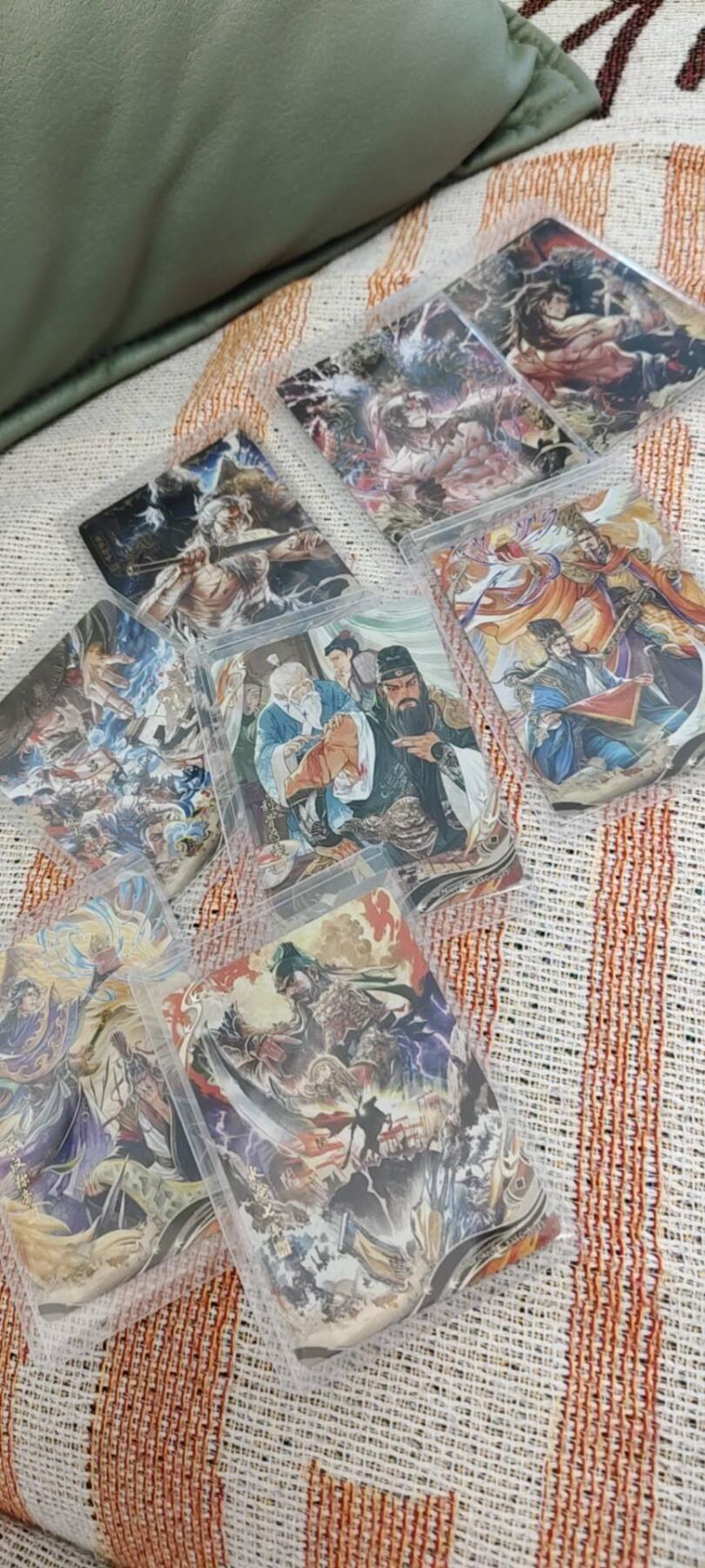 秋原瞳的小店第十六期（火辣辣的夏天，卡游最火哪吒和昆仑万象最火项目激情碰撞） 卡游三国6弹千古一瞬一套齐，包括主题卡水淹七军