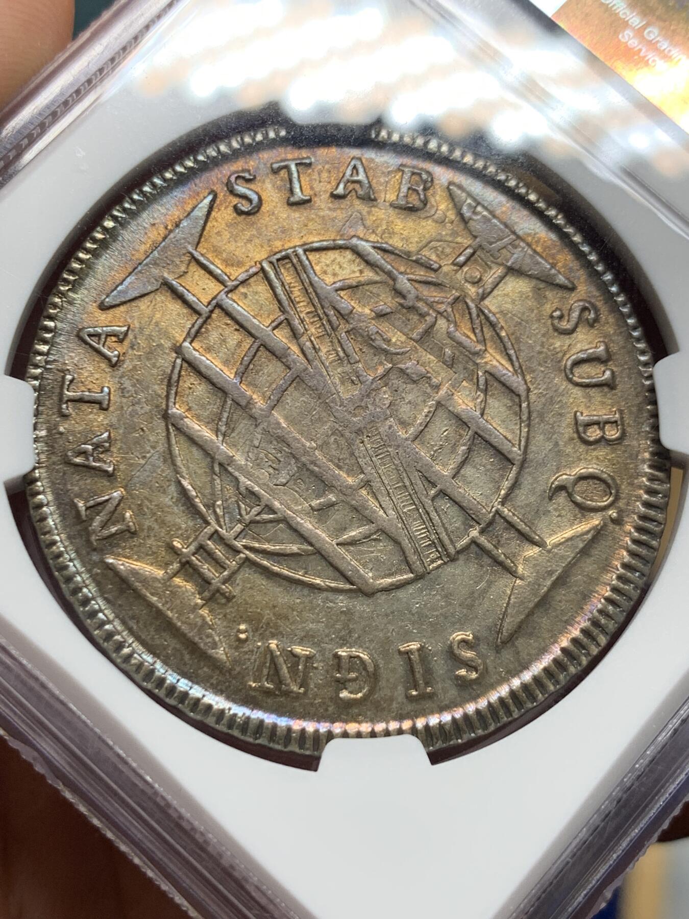 《竞宝斋》第396场 周日，周一，2场连拍 （全场包邮） NGC AU58 巴西1815年960瑞斯银币 币面深五彩彩包浆 观感极好