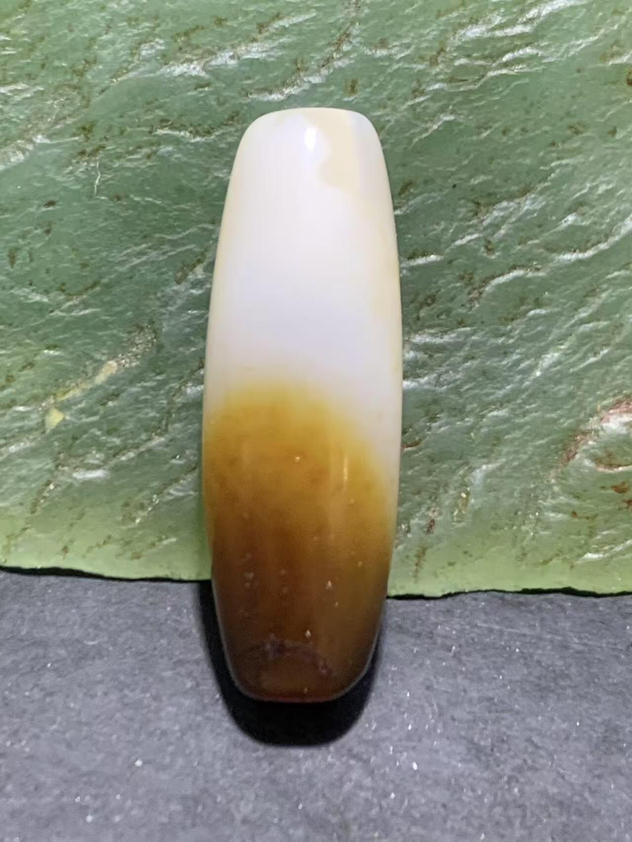 高玉化缠丝玛瑙随形通货桶珠一个，。