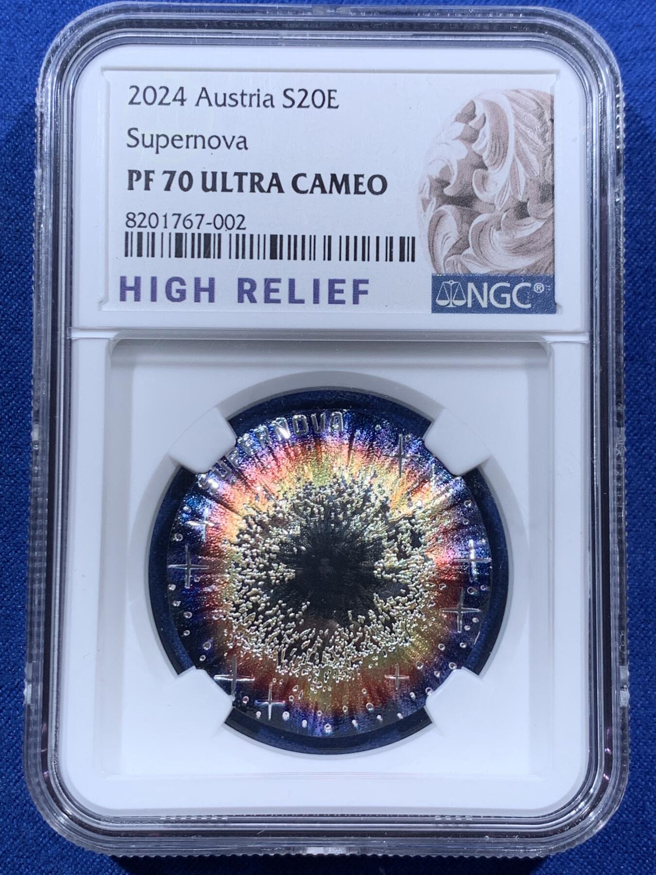 《竞宝斋》第396场 周日，周一，2场连拍 （全场包邮） 高浮雕特标 NGC PF70UC 奥地利2024年宇宙之美系列1超新星20欧精制彩银纪念银币（加厚盒装，克劳斯2025年世界硬币大奖赛最佳艺术提名币，热门高概率命中夺冠品）盒证齐全