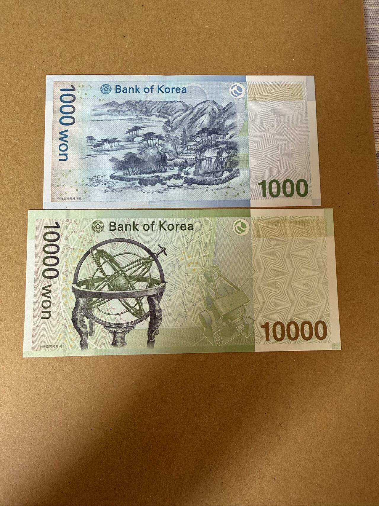 【炜奕收藏】，第三十八期 韩国1000&10000元，UNC品相