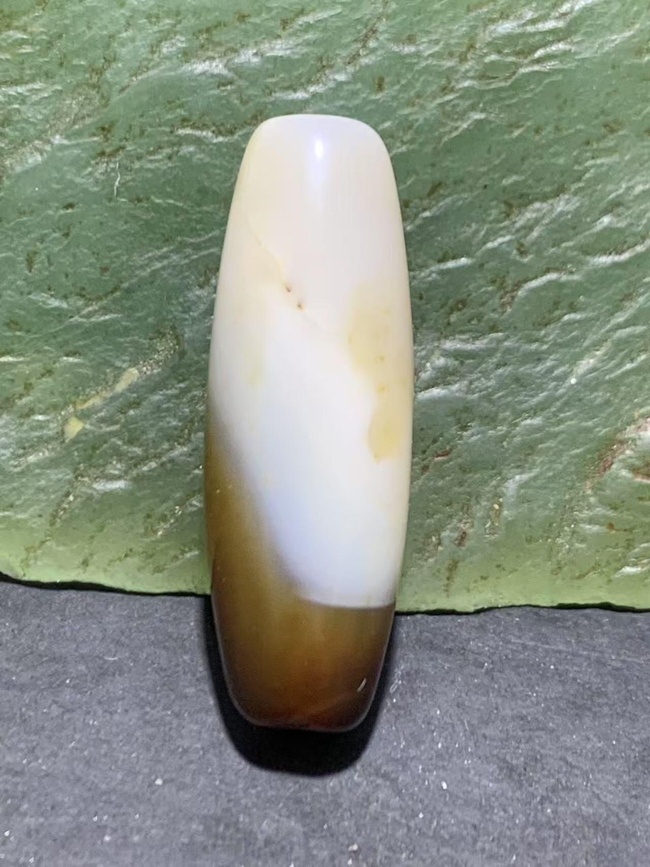 高玉化缠丝玛瑙随形通货桶珠一个，。
