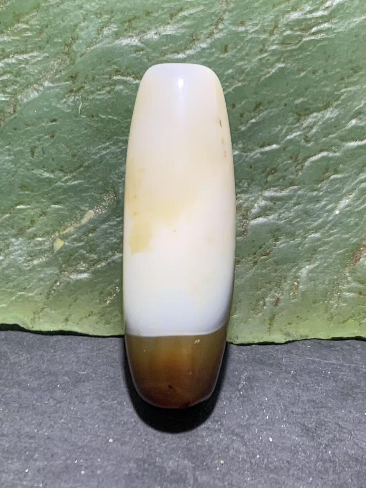 高玉化缠丝玛瑙随形通货桶珠一个，。