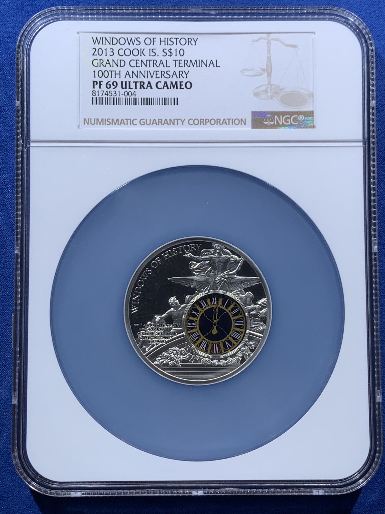 《竞宝斋》第396场 周日，周一，2场连拍 （全场包邮） NGC PF69UC 库克2013年发行历史之窗系列-纽约中央火车站镶嵌彩色钴玻璃10元精制艺术银币（加大盒，限量发行1913枚，50克925银，采用双面镂空浮雕+手工镶嵌玻璃。）盒证齐全
