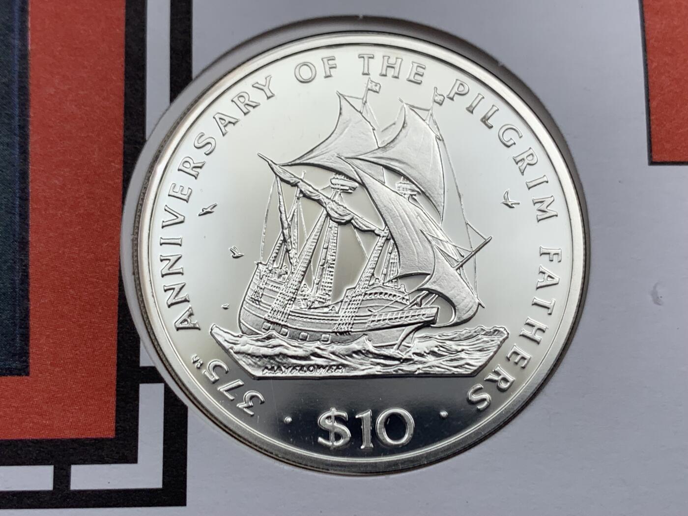 《竞宝斋》第396场 周日，周一，2场连拍 （全场包邮） 英国2003年酒吧经典招牌纪念邮币封，含1995年利比里亚10元精制纪念克朗银币，5月花号，925银，31.1克。精美设计，稀趣题材，图案邮票皆为英国经典酒馆招牌。