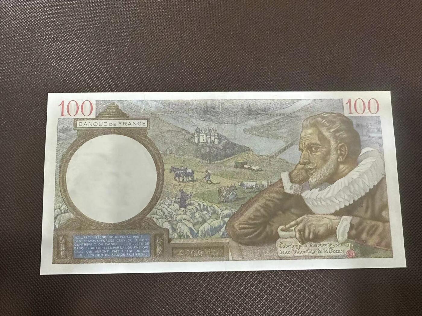 喜羊羊钱币收藏2025第6期 	法国	P-94 1941年100法郎	UNC-针孔,裂口				V.23742 066		
