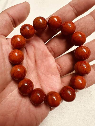 玉石翡翠玛瑙｜拍卖专场 瓦西南红双色火焰纹单圈佛珠手串｜配凉山州检证书