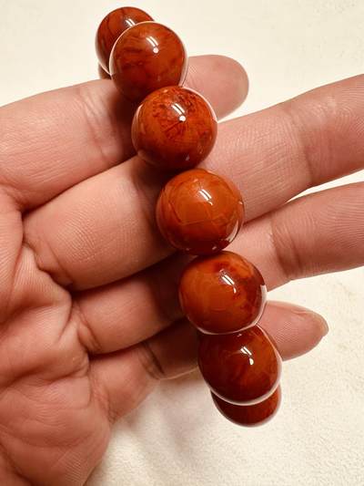 玉石翡翠玛瑙｜拍卖专场 瓦西南红双色火焰纹单圈佛珠手串｜配凉山州检证书