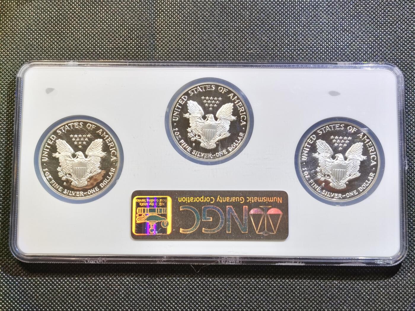  甄臻铺-世界币章拍卖（第23期），送拍享返佣金等优惠多多 NGC-PF69UC 美国1989-1991年行走女神1美元鹰洋精制银币 3枚套盒 美国鹰洋少见早期版本 PROOF版本发行量更为稀少