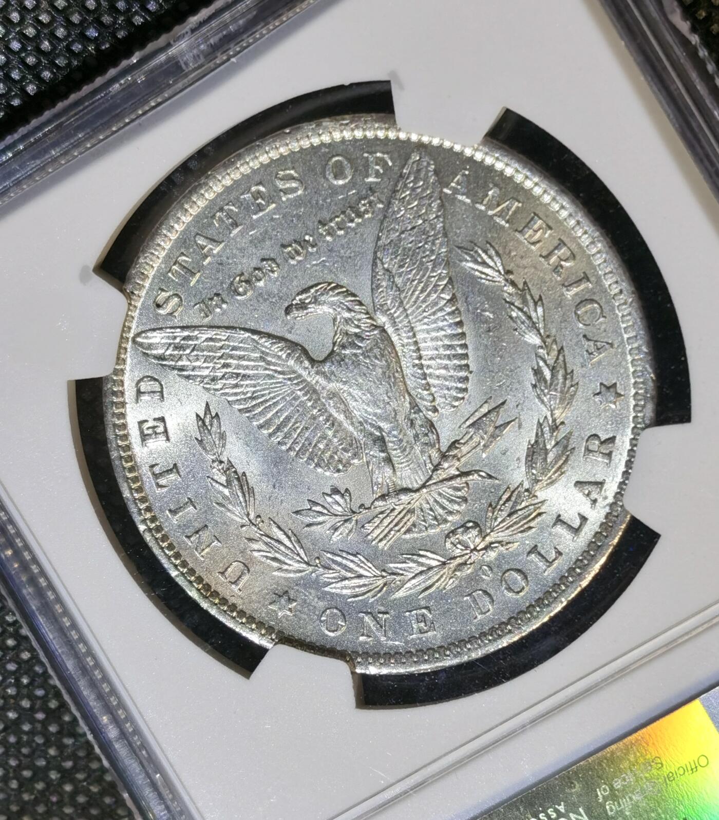  甄臻铺-世界币章拍卖（第23期），送拍享返佣金等优惠多多 NGC-MS62 美国1884年摩根银币，卷首极品落日金彩，光度很好，少见状态