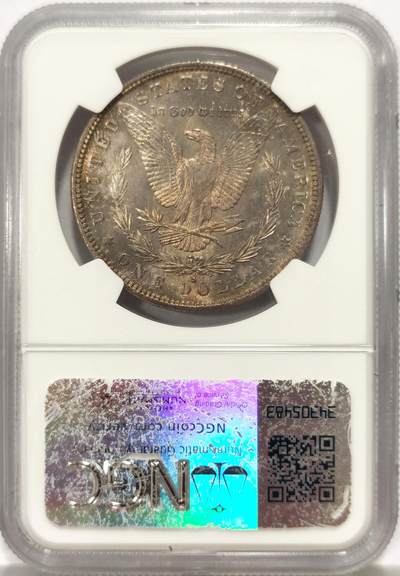 博洋堂世界钱币拍卖第129期（全场包邮） 1882年美国摩根银币S版NGC-MS63，原汁原味五彩老包浆，包浆醇厚，正面类PL镜面，背面五彩，转光强烈细节优秀，状态极佳。