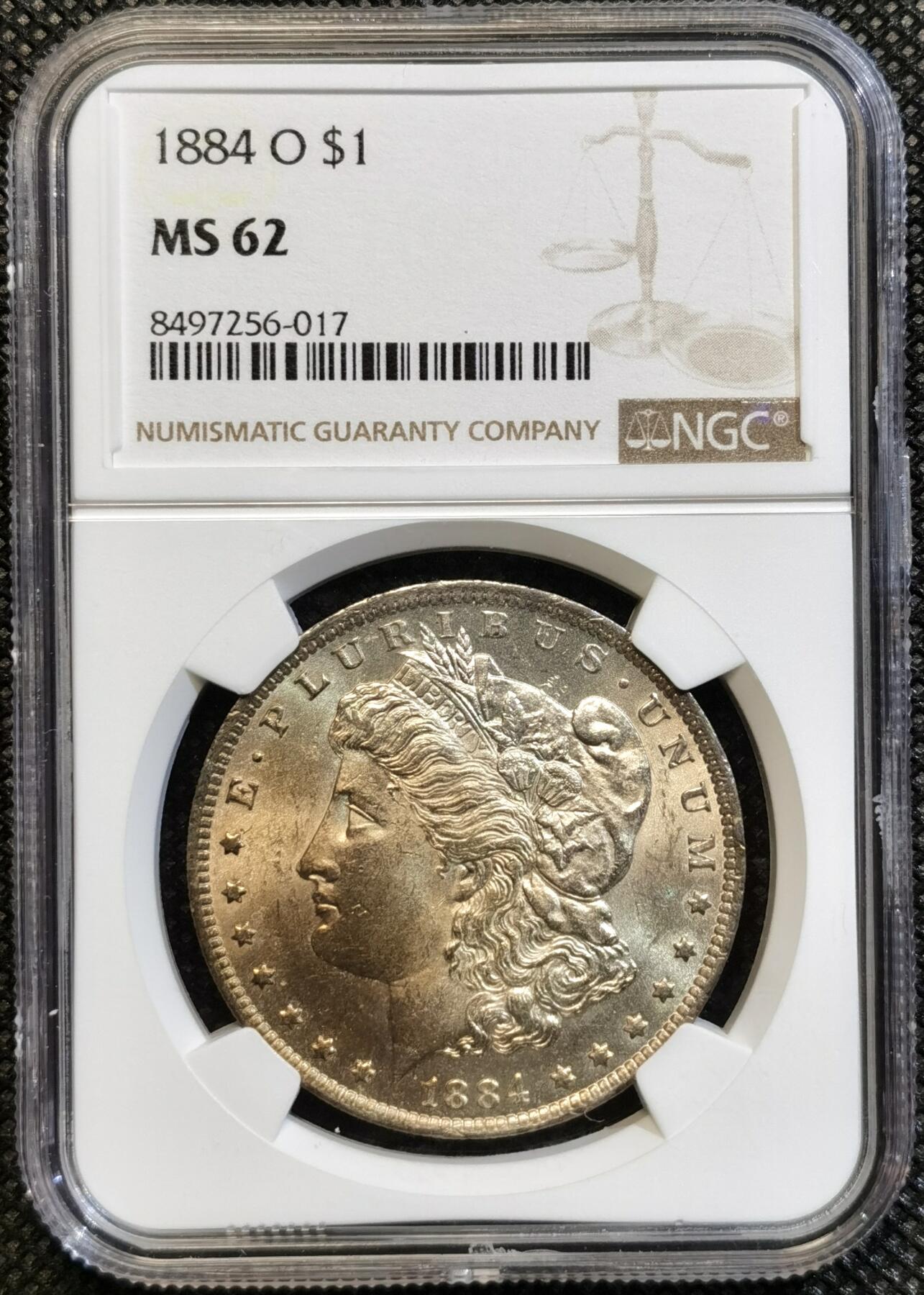  甄臻铺-世界币章拍卖（第23期），送拍享返佣金等优惠多多 NGC-MS62 美国1884年摩根银币，卷首极品落日金彩，光度很好，少见状态