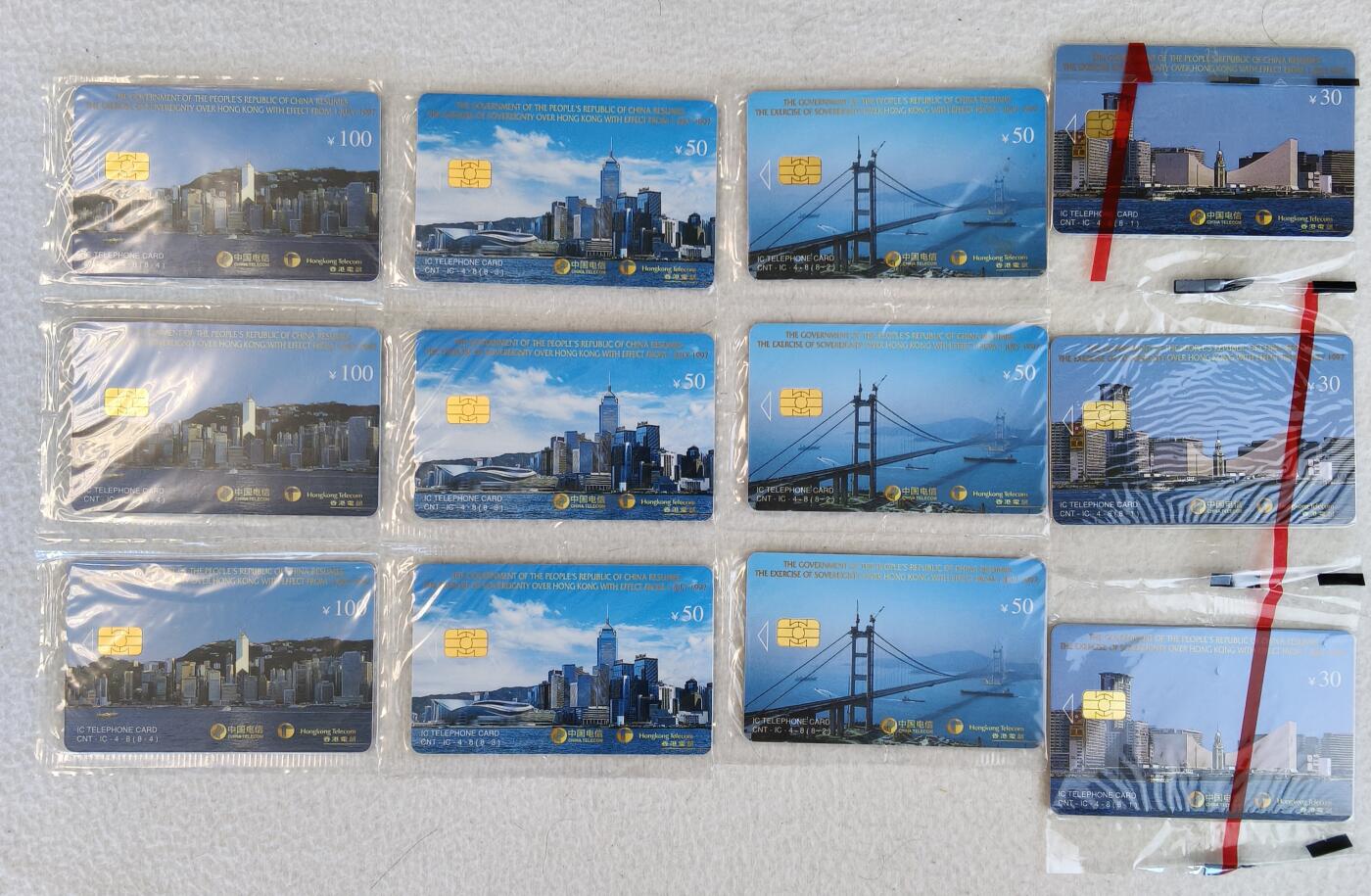 易卡拍卖第23期 IC—4香港回归8枚，3套连同拍。（LN辽宁版）原封套，全新卡，收藏级品相。品相如图所示！