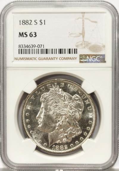 博洋堂世界钱币拍卖第129期（全场包邮） 1882年美国摩根银币S版NGC-MS63，原汁原味五彩老包浆，包浆醇厚，正面类PL镜面，背面五彩，转光强烈细节优秀，状态极佳。