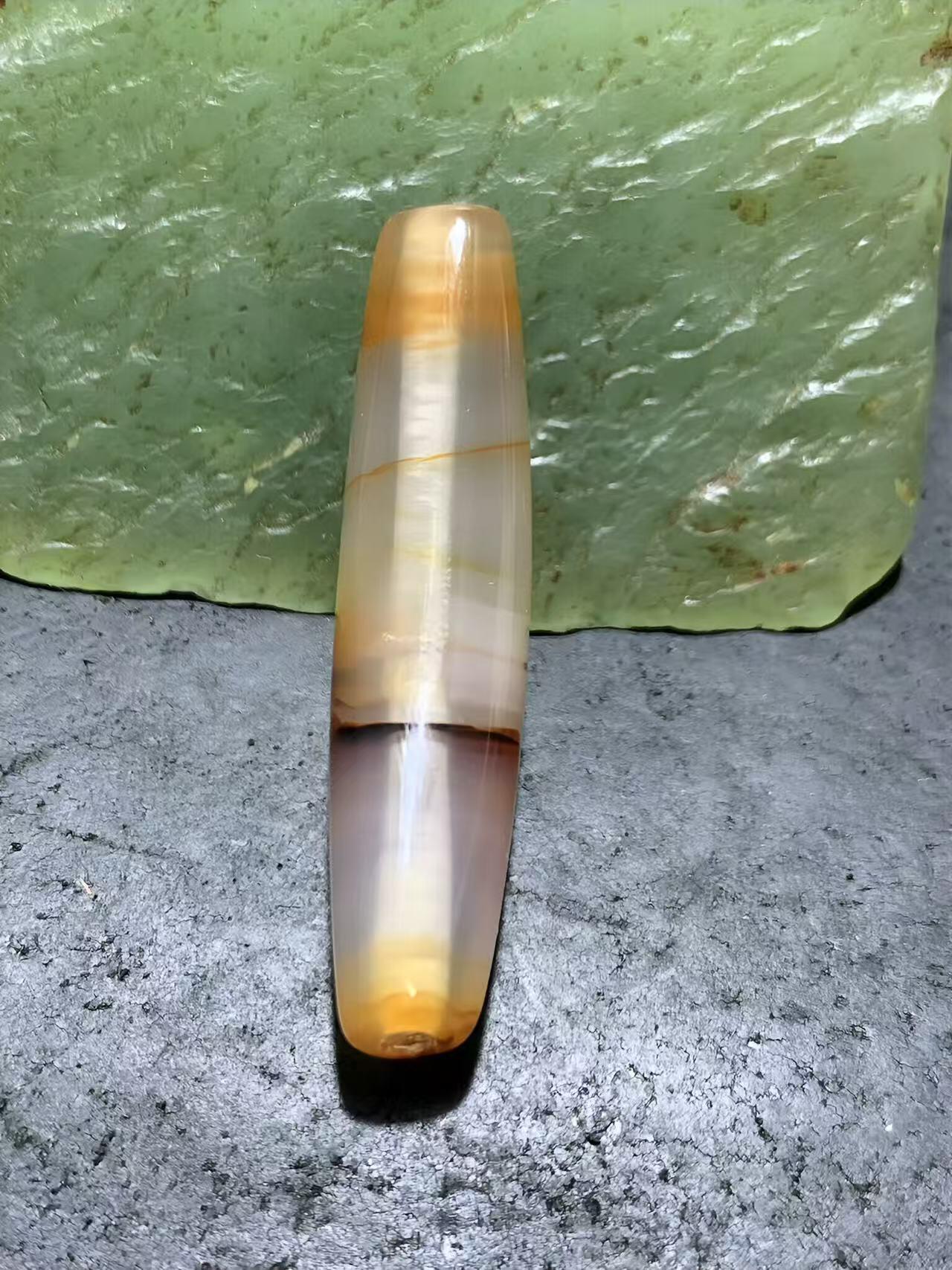 精美高玉化冻料缠丝玛瑙锁骨坠，（牛角珠）一颗，