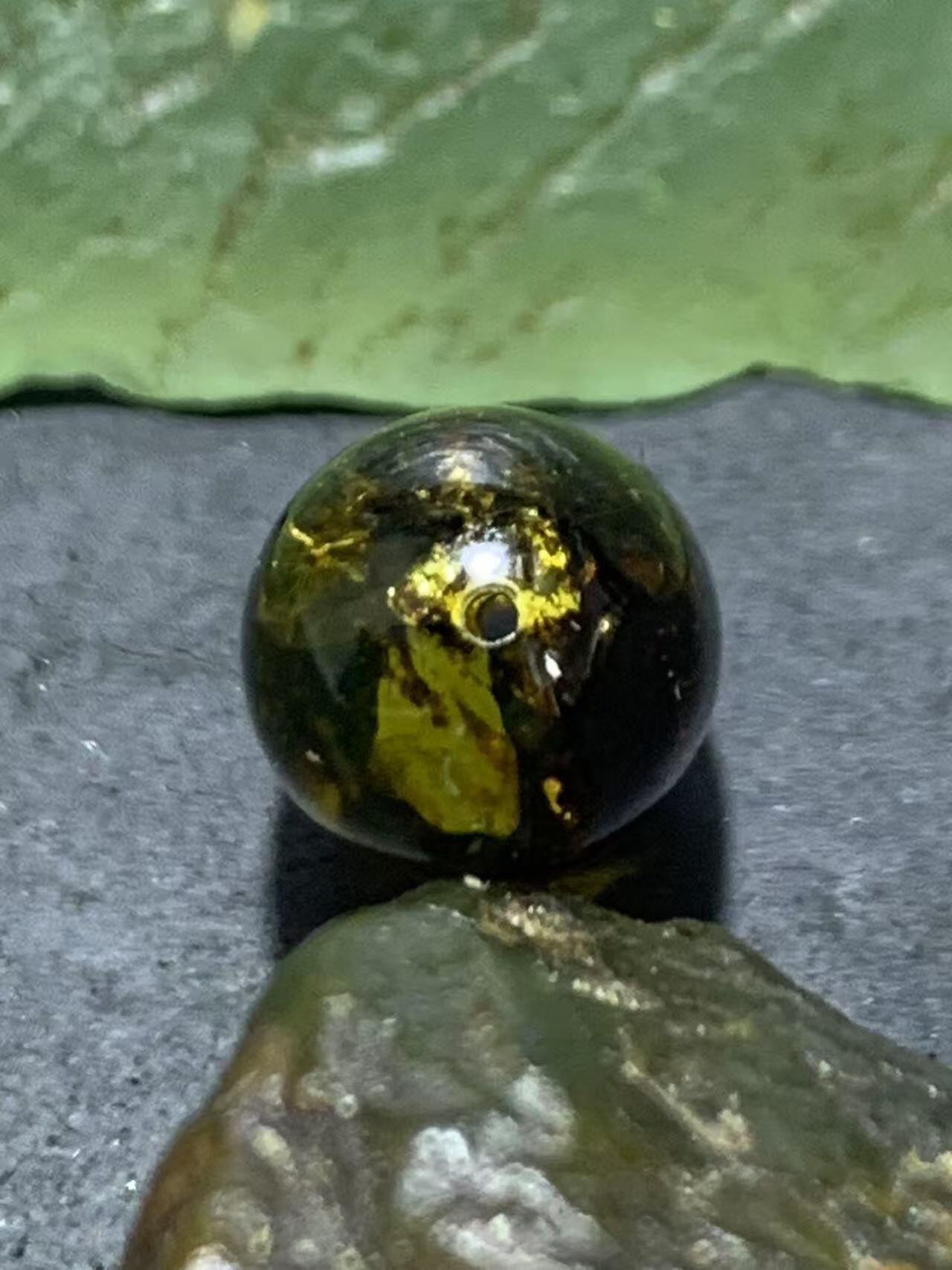 精美乌克兰花珀枣形桶珠一个