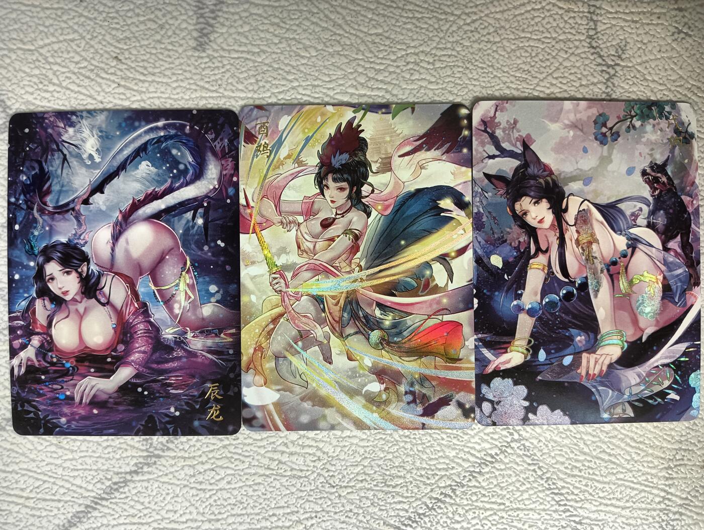 花开卡拍第29期（品控勿拍!!!拍品不寄存，运费5元，自制卡难免瑕疵，可能存在轻微撞角爆边等出厂瑕疵，品控介意勿拍！） 燎原玲姐生肖特卡 辰龙酉鸡戌狗 彩闪3张