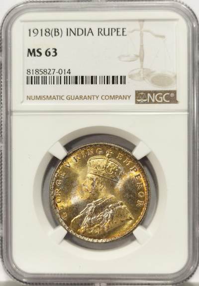 博洋堂世界钱币拍卖第129期（全场包邮） NGC MS63 英属印度1918年乔治五世1卢比银币 正面黄油光向橘黄色渐变，背面浅包浆银霜漂亮。达到63分的卢比就已经迈入大众好品相的标准了，划痕对于62分会少很多，加之来自库存品相完全未流通的出厂品相，光度会特别好。