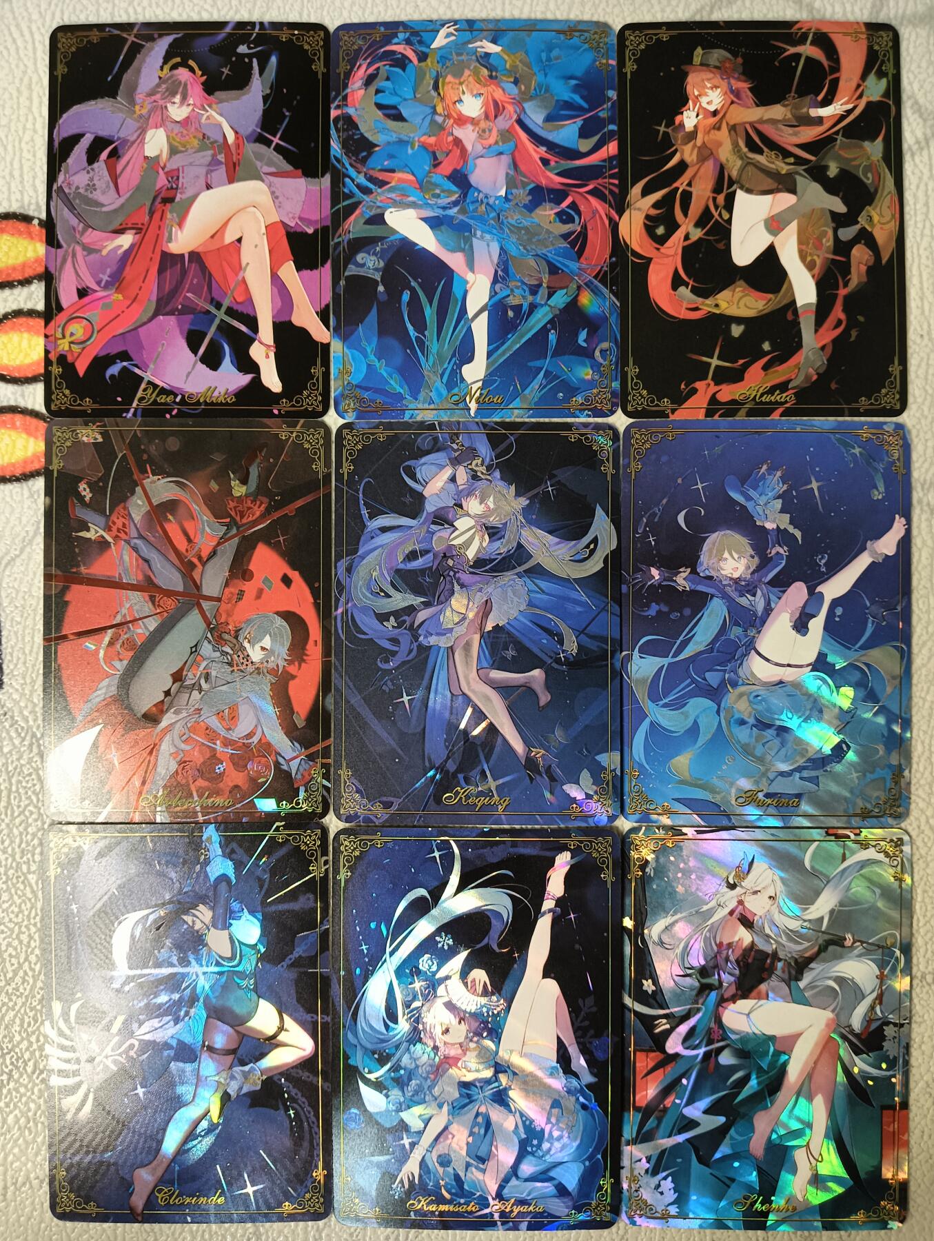花开卡拍第29期（品控勿拍!!!拍品不寄存，运费5元，自制卡难免瑕疵，可能存在轻微撞角爆边等出厂瑕疵，品控介意勿拍！） 驴歪歪 原神霞光闪一套九张