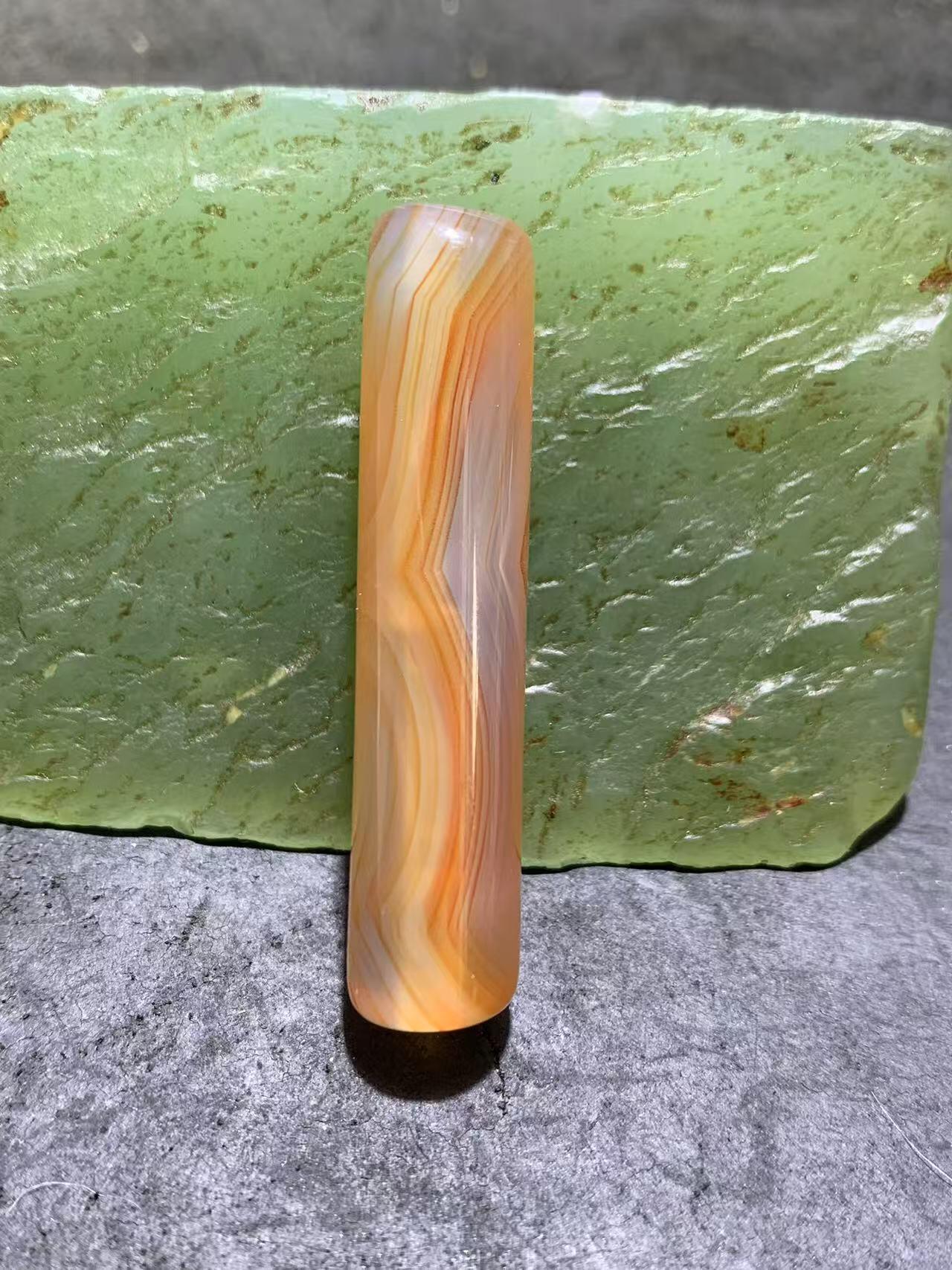 精美高玉化风化纹天眼缠丝玛瑙随形珠一颗。