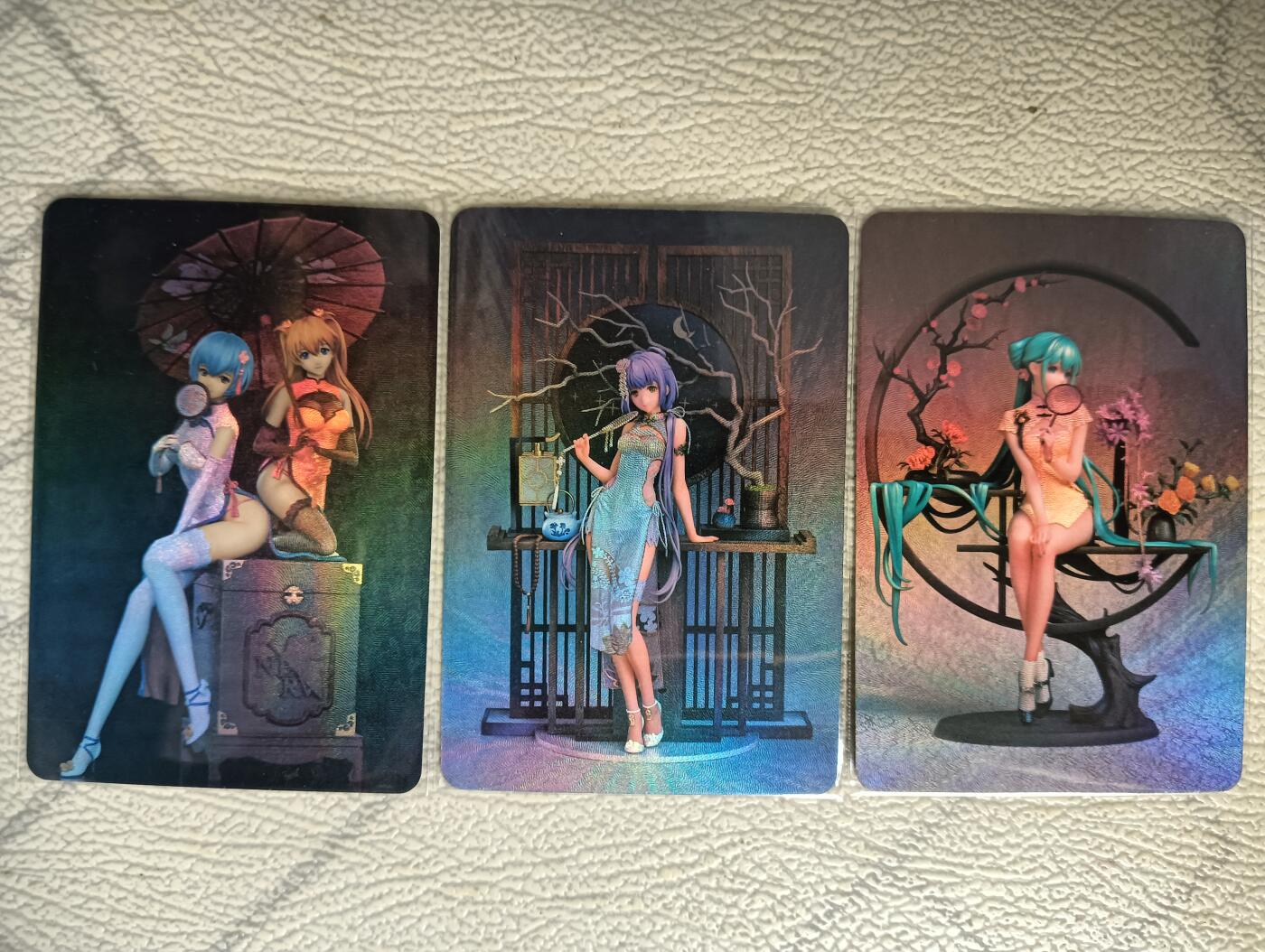 花开卡拍第29期（品控勿拍!!!拍品不寄存，运费5元，自制卡难免瑕疵，可能存在轻微撞角爆边等出厂瑕疵，品控介意勿拍！） 宁缺卡牌 手办卡3张 折光彩闪 EVA明日香绫波丽+洛天依+初音未来
