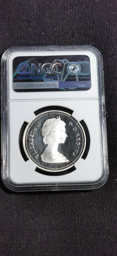 刘世昌艺术品销售中心～虎踞龙蟠*金杨在线联拍群第521期 加拿大1986年“温哥华铁路开通百年”精制纪念银币（NGC   PF69UC    串号：6804623-043）1枚。此币荣获当年“世界硬币大奖赛～最佳银币、最佳克朗币”两项大奖。