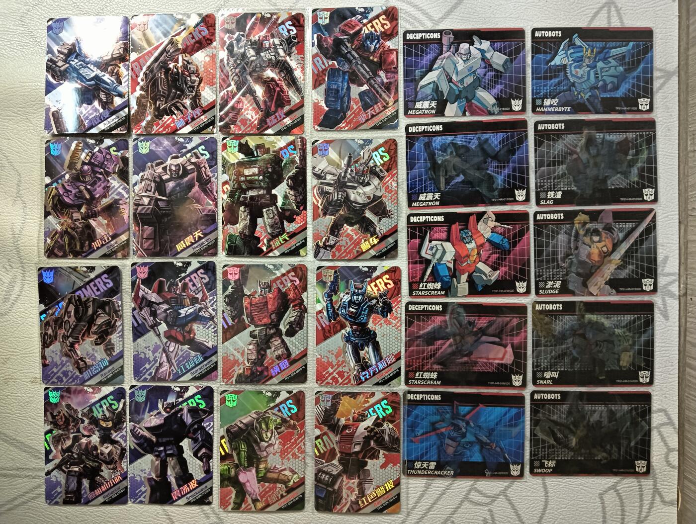 花开卡拍第29期（品控勿拍!!!拍品不寄存，运费5元，自制卡难免瑕疵，可能存在轻微撞角爆边等出厂瑕疵，品控介意勿拍！） 卡游变形金刚第一弹 hr卡20张一套有两套共40张，ssr卡一套16张 总共56张