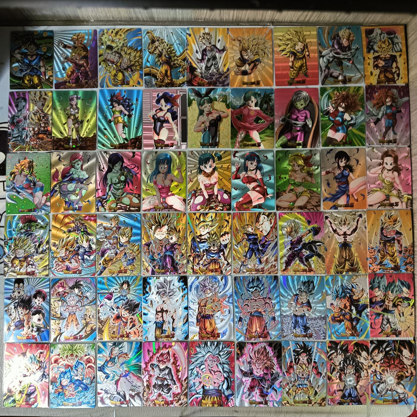 花开卡拍第29期（品控勿拍!!!拍品不寄存，运费5元，自制卡难免瑕疵，可能存在轻微撞角爆边等出厂瑕疵，品控介意勿拍！） 大卡道 战损龙珠卡第1季+第2季 粗闪+镭射金 一套108张 无卡砖特卡