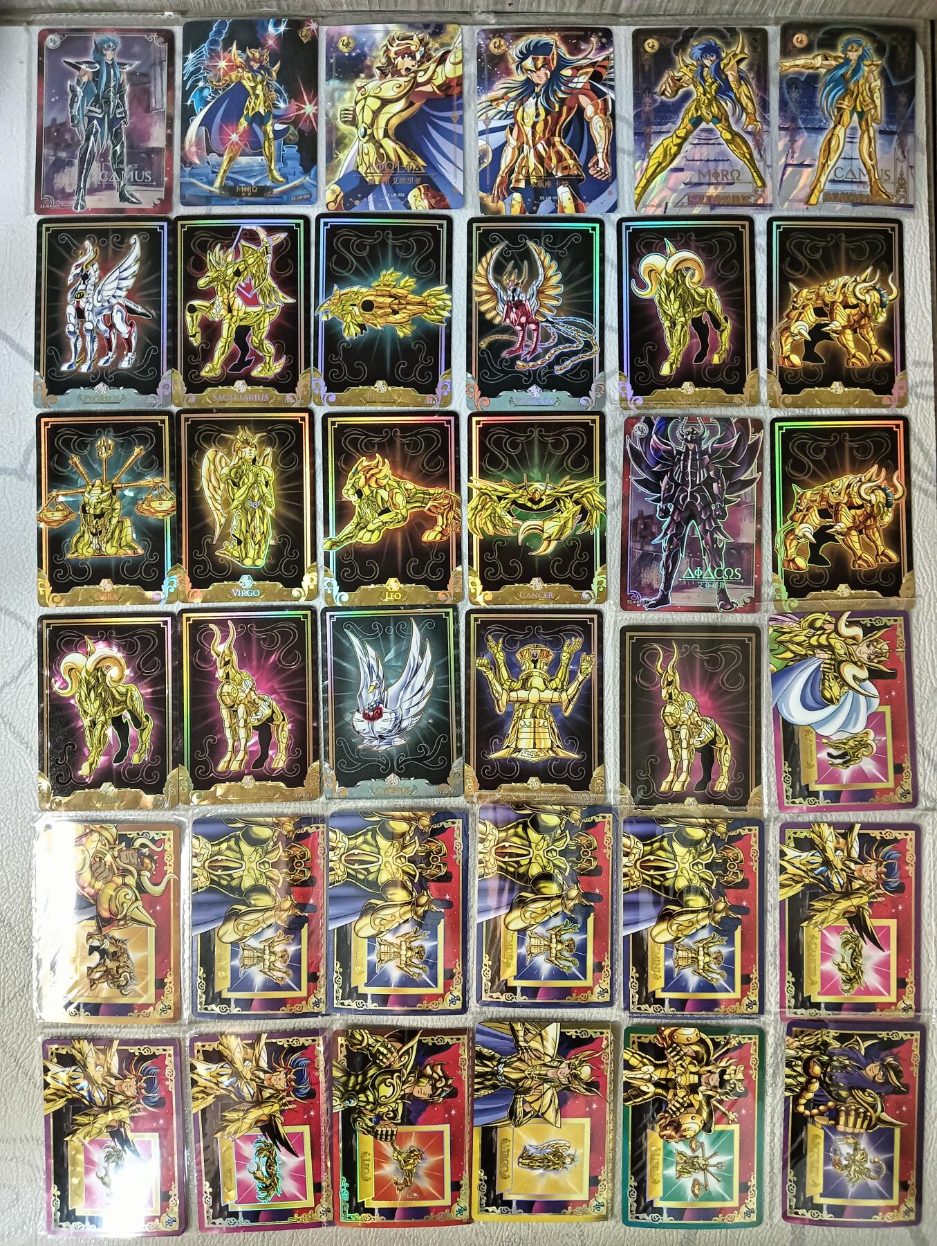 花开卡拍第29期（品控勿拍!!!拍品不寄存，运费5元，自制卡难免瑕疵，可能存在轻微撞角爆边等出厂瑕疵，品控介意勿拍！） 卡游圣斗士 mr2张 ur5张 ar36张 qr11张ssr7张 总共61张