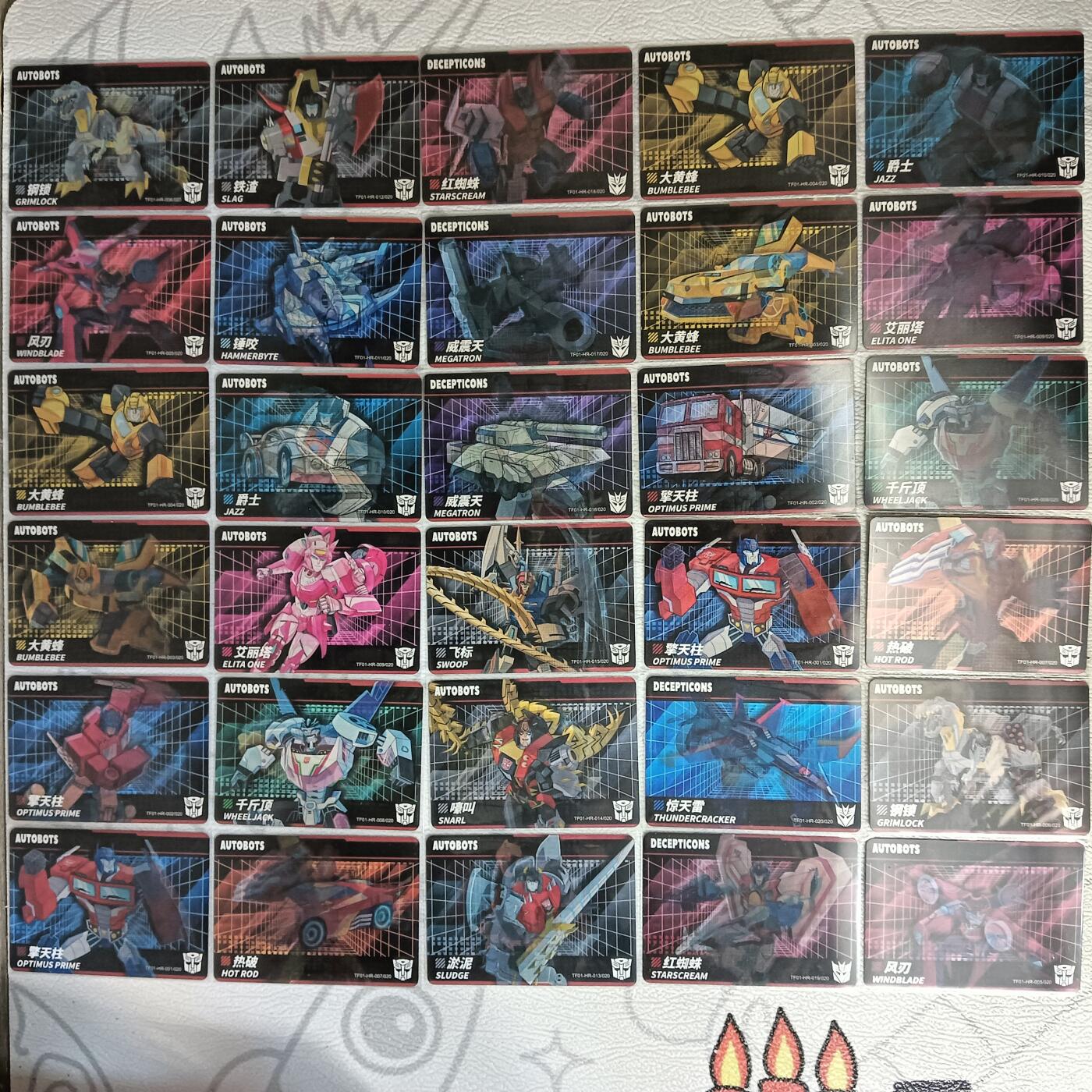 花开卡拍第29期（品控勿拍!!!拍品不寄存，运费5元，自制卡难免瑕疵，可能存在轻微撞角爆边等出厂瑕疵，品控介意勿拍！） 卡游变形金刚第一弹 hr卡20张一套有两套共40张，ssr卡一套16张 总共56张