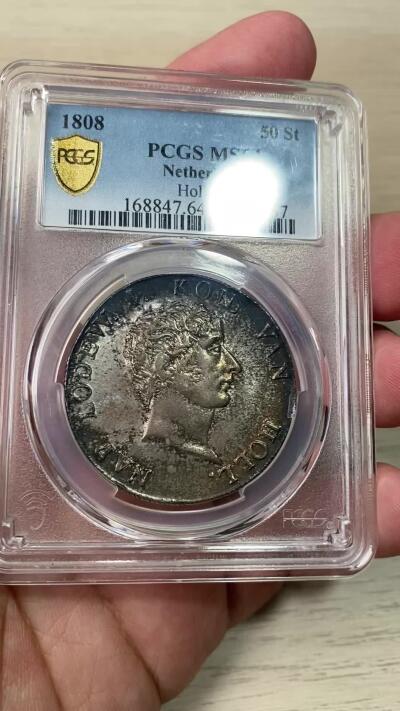 万国钱币拍卖第049期（万国夏季大拍） PCGS MS64 1808年法占荷兰王国拿破仑50Stuvier 26.35g大银主币 法国鹰与荷兰狮同框 厚重环五彩 深打车轮光  一步到位的顶级品相