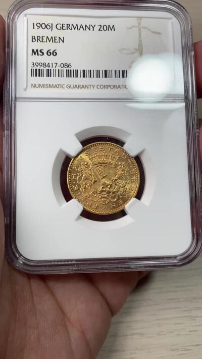 万国钱币拍卖第049期（万国夏季大拍） NGC MS66 1906年德国不莱梅双狮护盾长翅流通20马克金币 罕见自由市最大面值金马克 仅单年发行两万枚 书价极高 顶级GEM品质 7.96g 900金