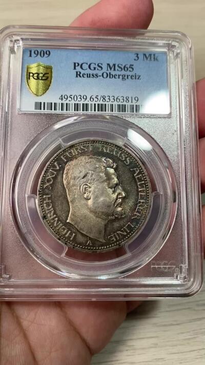 万国钱币拍卖第049期（万国夏季大拍） PCGS MS65 1909年德国罗伊斯-上格莱茨亲王国亨利二十四世长翅流通3马克 单年发行一万枚的小邦品种 此邦国没有发行过5马克 3马克便是最大银面值 原味幻彩BU品质 PC冠军分