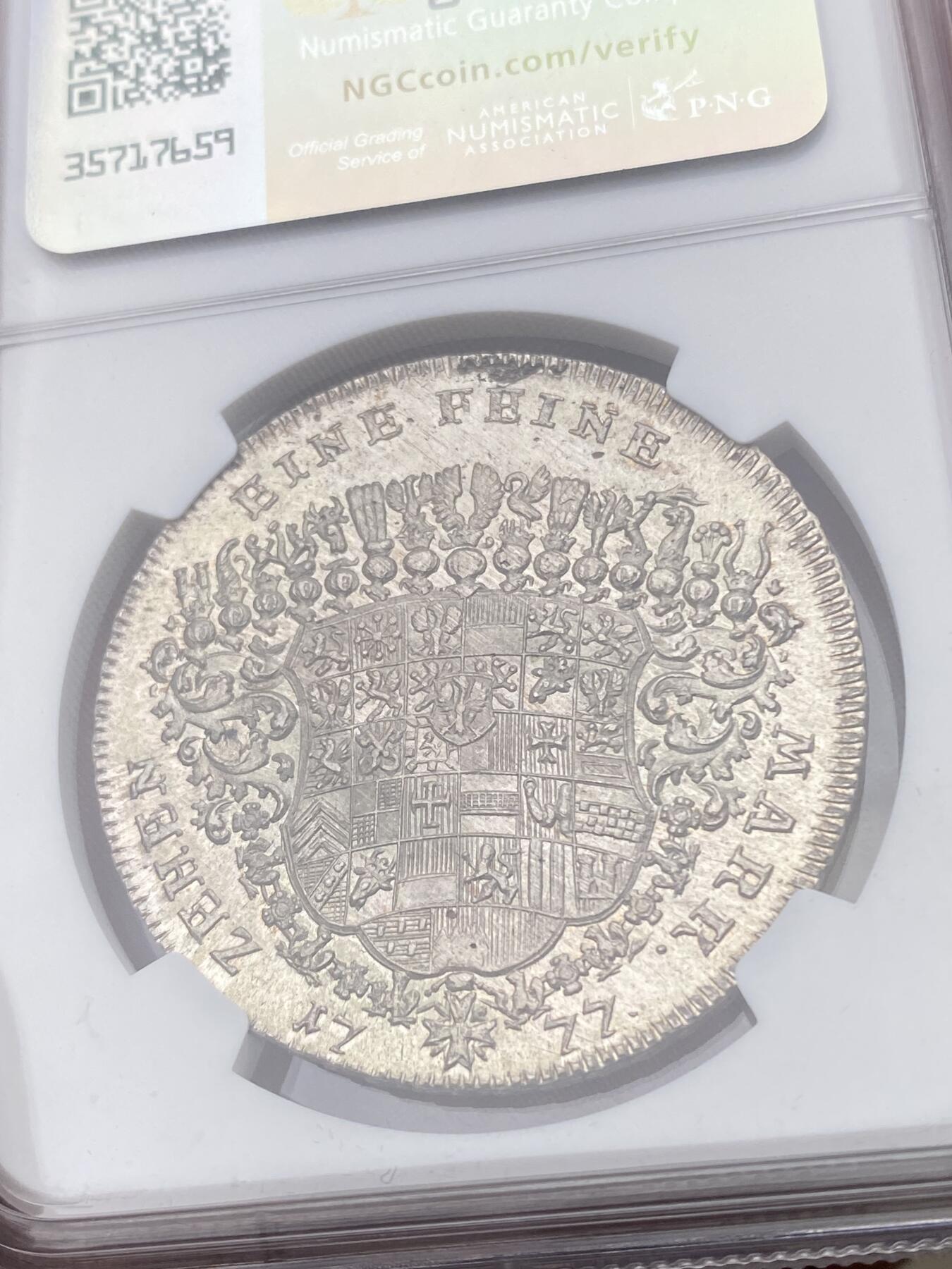 万国钱币拍卖第049期（万国夏季大拍） NGC MS65+ 1777德国勃兰登堡-安斯巴赫亚历山大亲王纹章泰勒 施瓦巴赫造币厂铸造 拥有着极其华丽纹章的一枚大规格十八世纪小邦泰勒 历经两百余年时光洗礼依旧完美保持了其出厂时的全原光状态 上手绝对震撼的一枚 NGC唯一冠军分 独孤求败的王者品相