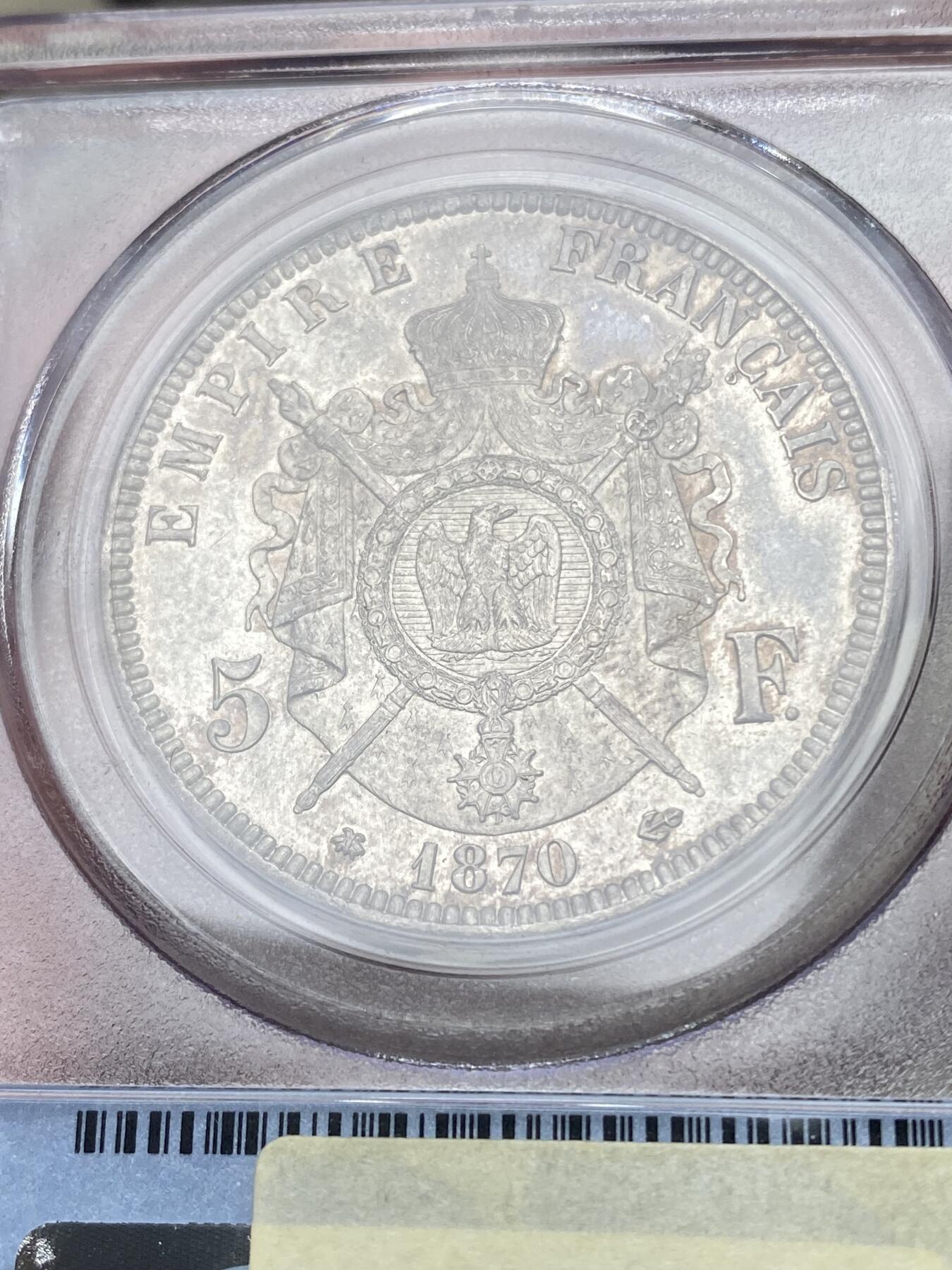 万国钱币拍卖第049期（万国夏季大拍） PCGS MS64 1870法国拿破仑三世纹章5法郎银币 虽是较常见品种 但是能到64分级别并不容易 原味纸袋包浆 PC老评水晶盒 状态极佳
