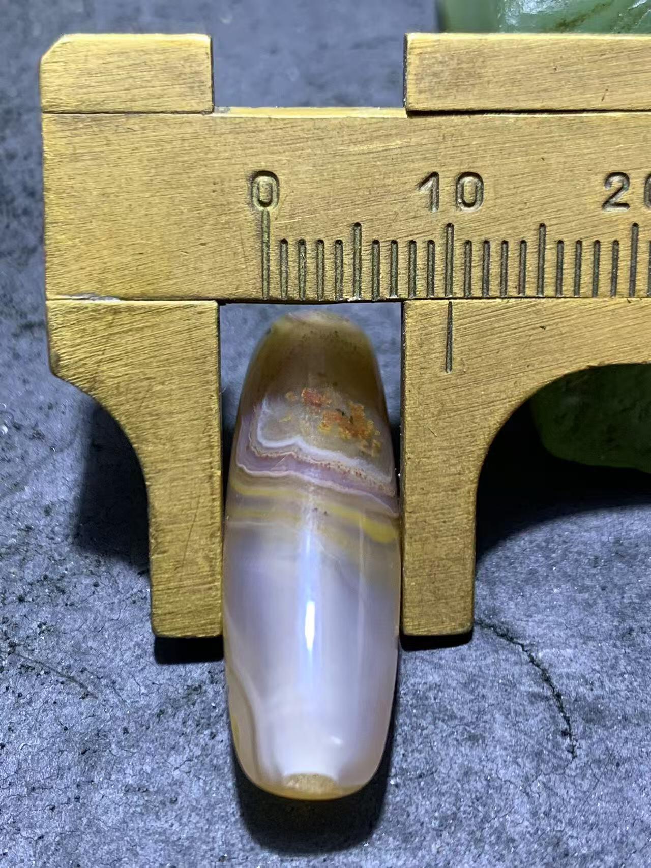 精美高玉化天眼纹巴西玛瑙随形桶珠一颗，