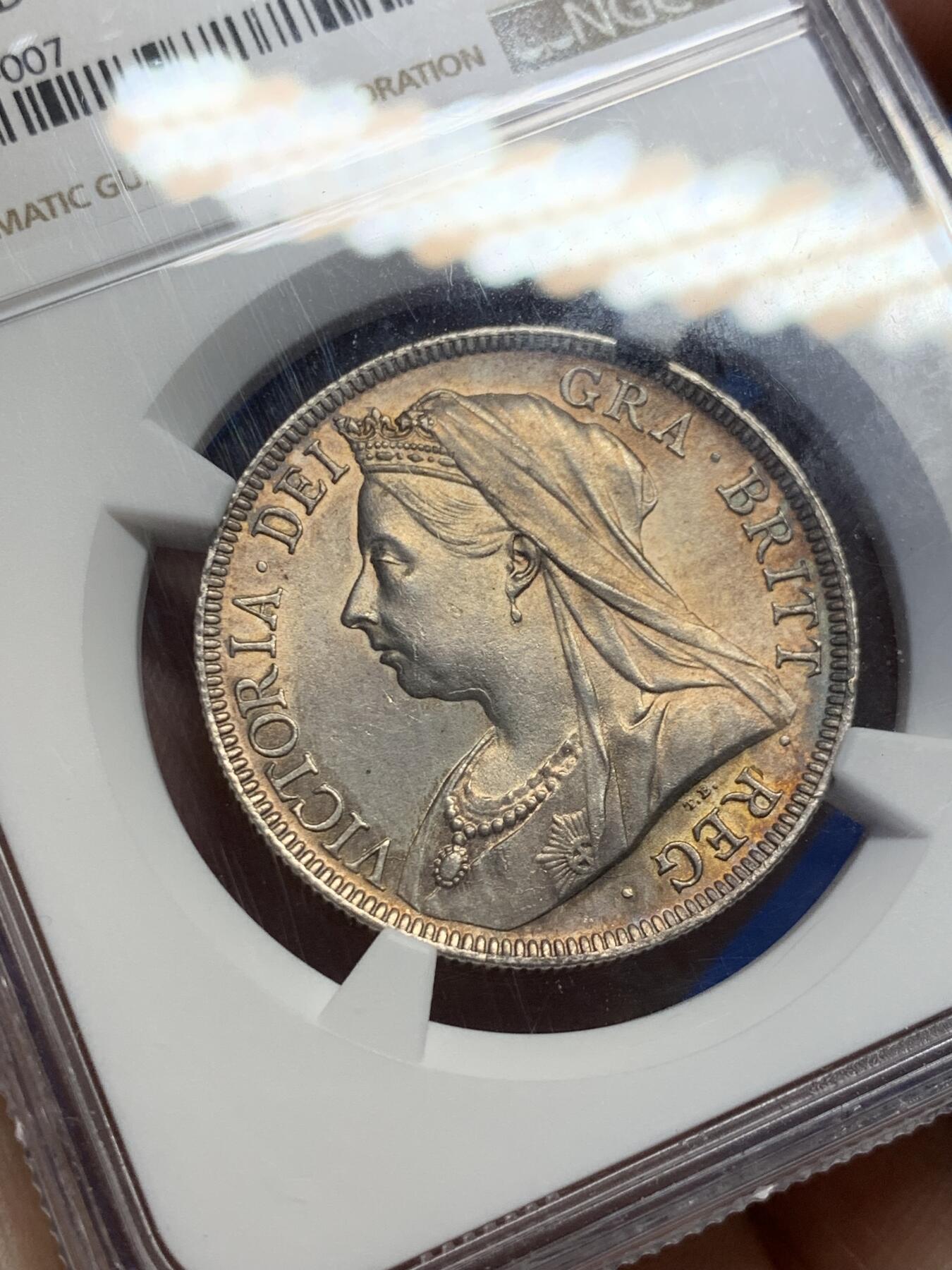 《竞宝斋》第398场 周日，周一，2场连拍 （全场包邮） NGC UNC 英国1897年维多利亚披纱半克朗银币 五彩包浆 细节极好