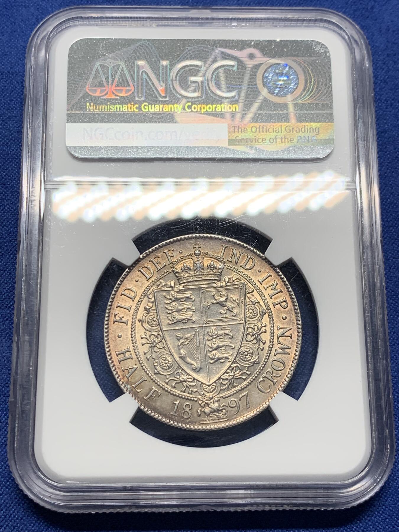 《竞宝斋》第398场 周日，周一，2场连拍 （全场包邮） NGC UNC 英国1897年维多利亚披纱半克朗银币 五彩包浆 细节极好