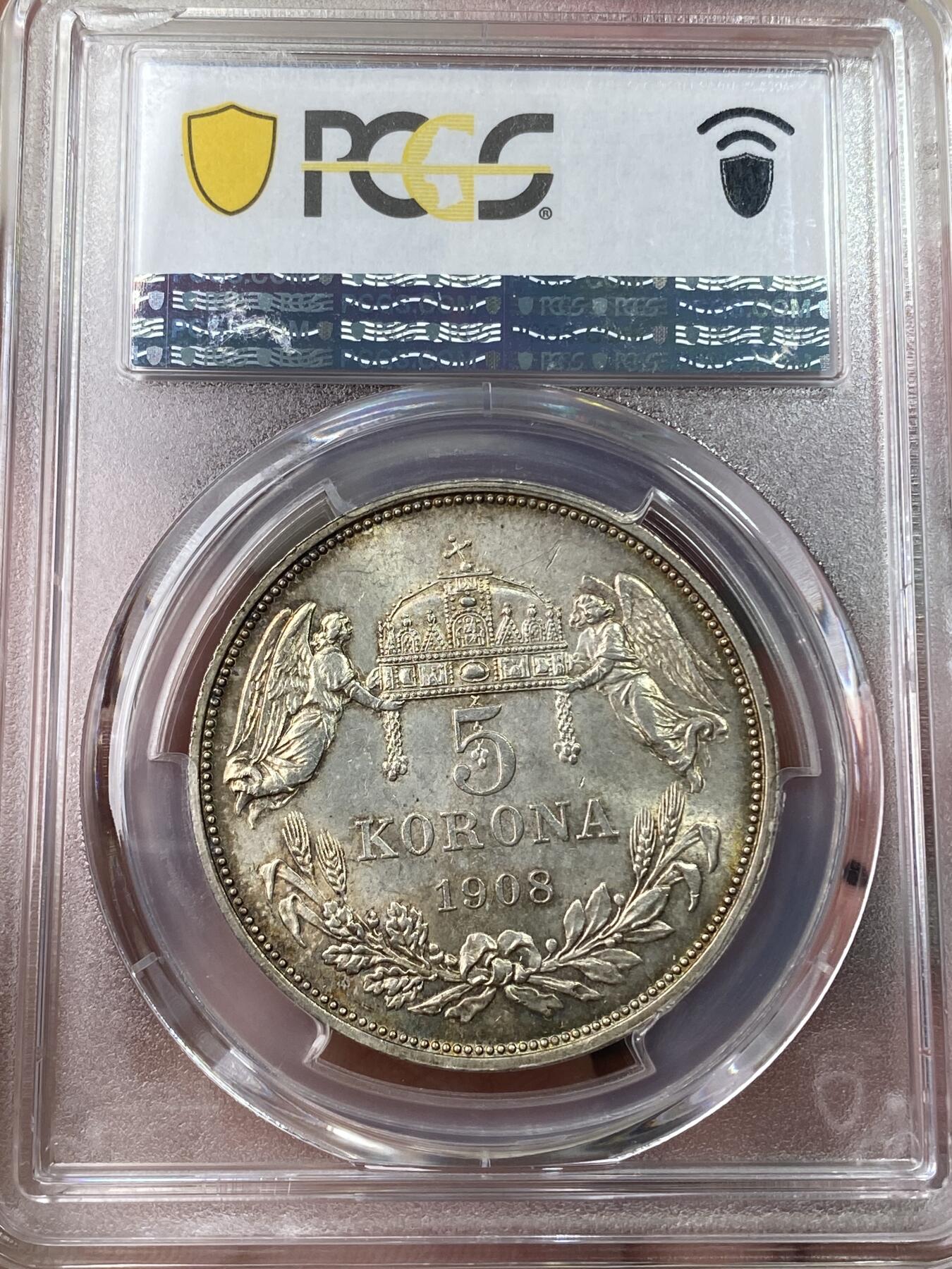 万国钱币拍卖第049期（万国夏季大拍） PCGS MS64 1908年匈牙利弗朗茨一世双天使5克朗大银 克雷姆琴察厂铸造 原光淡金环彩非常漂亮（盒子背面左上有磕碰）