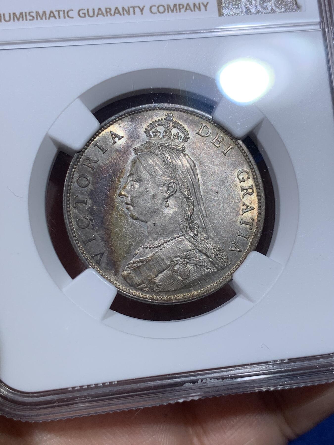 《竞宝斋》第398场 周日，周一，2场连拍 （全场包邮） NGC MS61 英国1887维多利亚弗洛林，正面五彩月牙包浆，带银霜，背面黑彩，正反相得益彰，宛若天边一抹晚霞绚丽