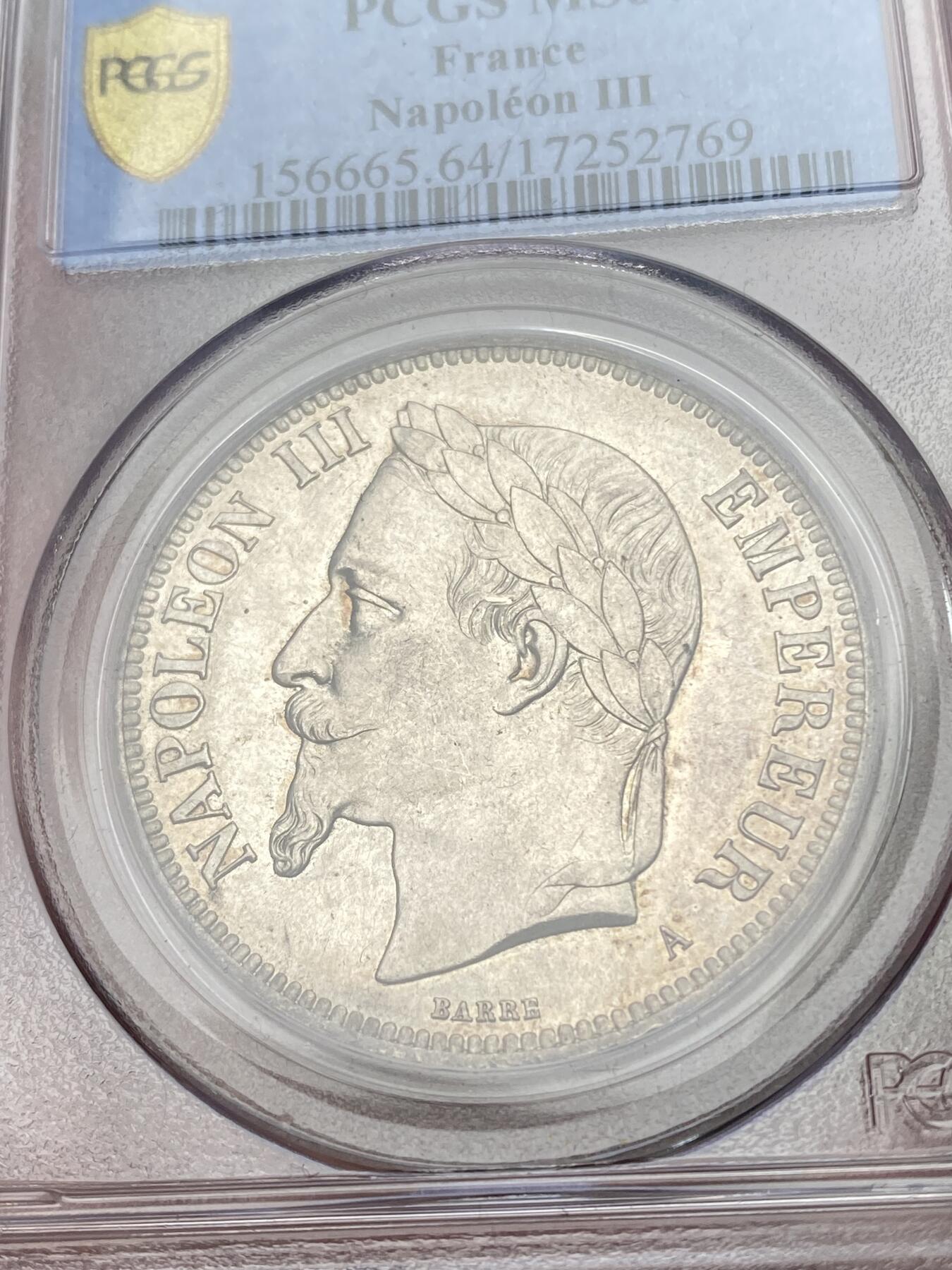 万国钱币拍卖第049期（万国夏季大拍） PCGS MS64 1870法国拿破仑三世纹章5法郎银币 虽是较常见品种 但是能到64分级别并不容易 原味纸袋包浆 PC老评水晶盒 状态极佳