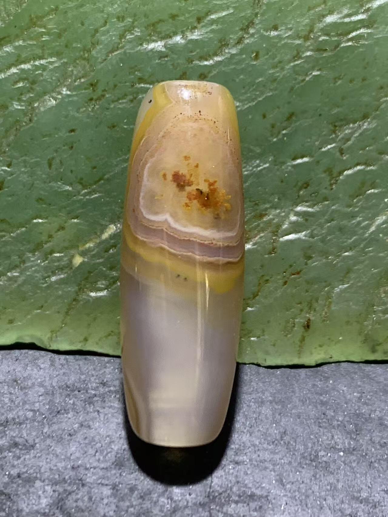 精美高玉化天眼纹巴西玛瑙随形桶珠一颗，