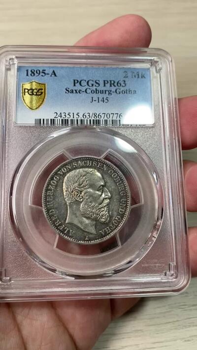万国钱币拍卖第049期（万国夏季大拍） PCGS PR63 1895年德国萨克森-科堡-哥达阿尔弗雷德大公长翅流通2马克 萨克森科堡所有面值的马克都是极其难得的存在 单年发行 精制更是凤毛麟角 原味镜面状态 PC唯一亚军分 更高分仅一枚