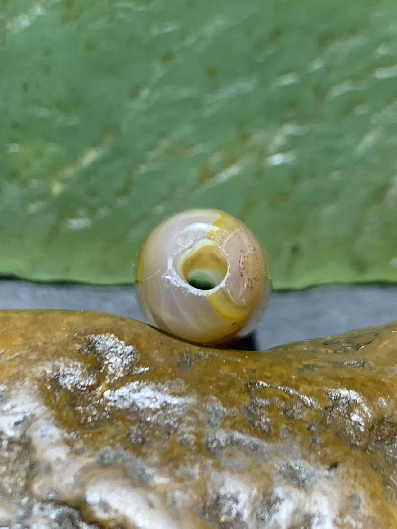 精美高玉化天眼纹巴西玛瑙随形桶珠一颗，