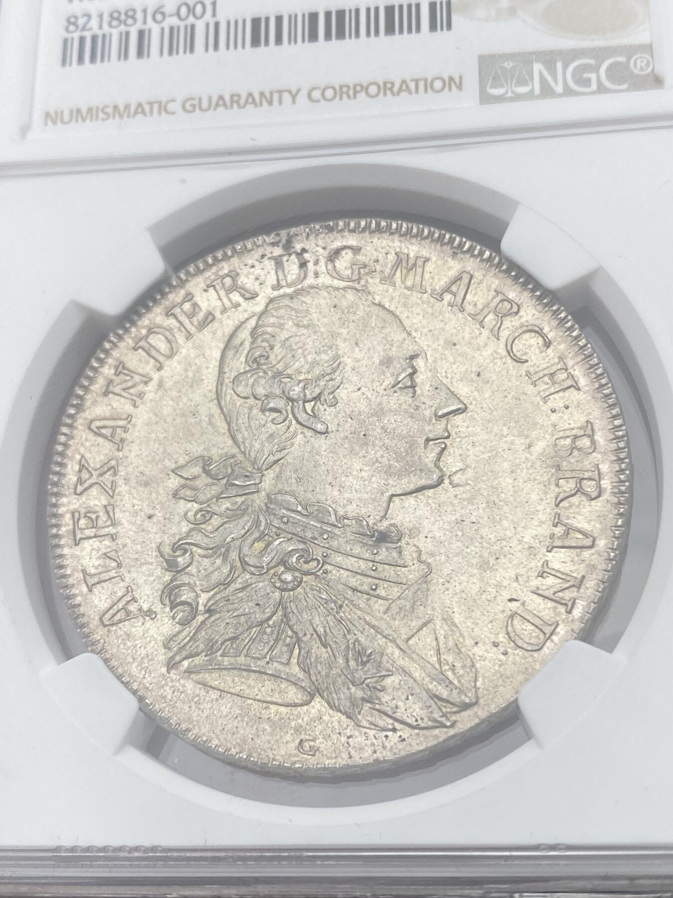 万国钱币拍卖第049期（万国夏季大拍） NGC MS65+ 1777德国勃兰登堡-安斯巴赫亚历山大亲王纹章泰勒 施瓦巴赫造币厂铸造 拥有着极其华丽纹章的一枚大规格十八世纪小邦泰勒 历经两百余年时光洗礼依旧完美保持了其出厂时的全原光状态 上手绝对震撼的一枚 NGC唯一冠军分 独孤求败的王者品相
